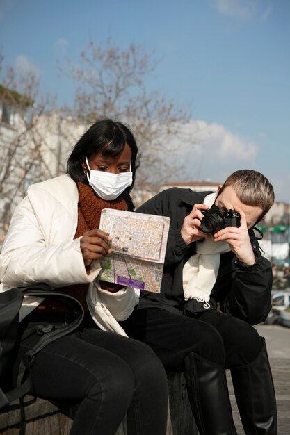 Couple of tourists checking a map