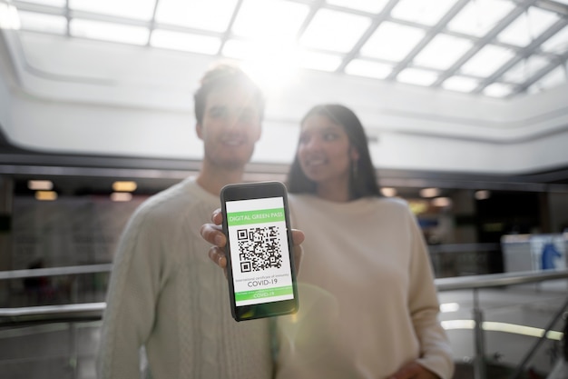 Couple traveling with vaccination passports