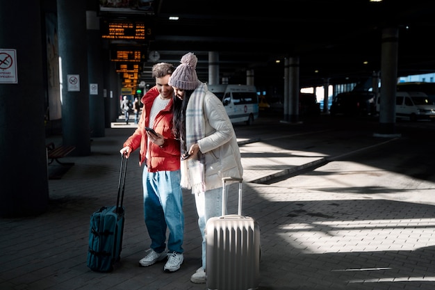 Free photo couple traveling with vaccination passports