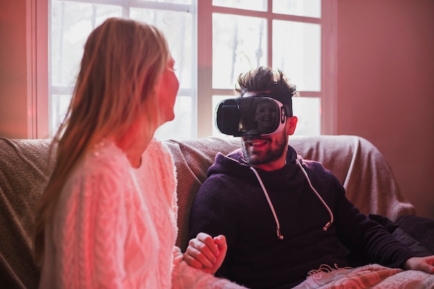 Free photo couple trying on vr glasses