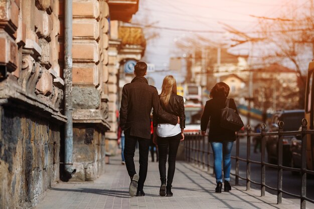 Couple walking away on the street