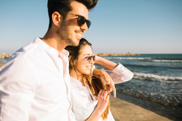 Couple walking on the beach