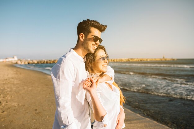 Couple walking on the beach