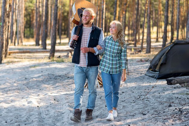 Couple walking in the woods