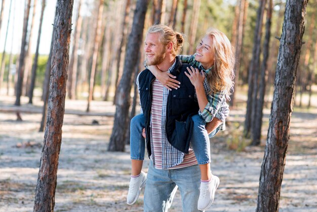 Couple walking in the woods