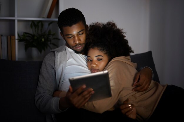 Couple watching streaming service at home