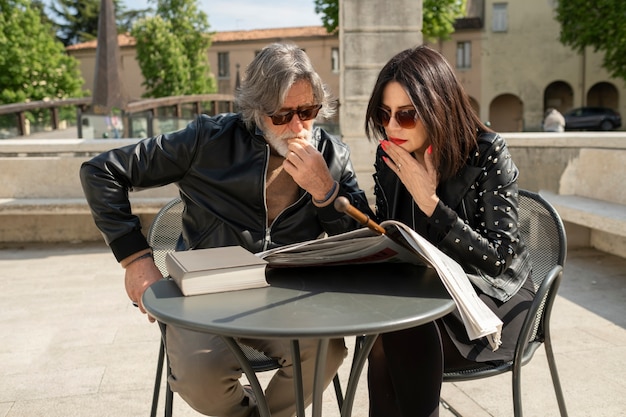 Couple wearing synthetic leather clothing