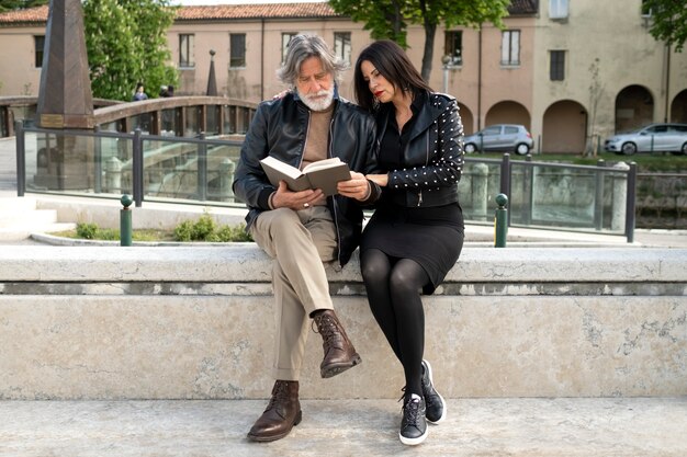 Couple wearing synthetic leather clothing