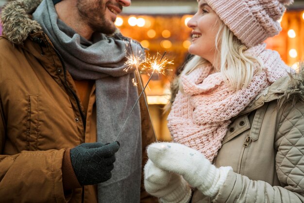 Couple in winter wearing jackets and scarfs