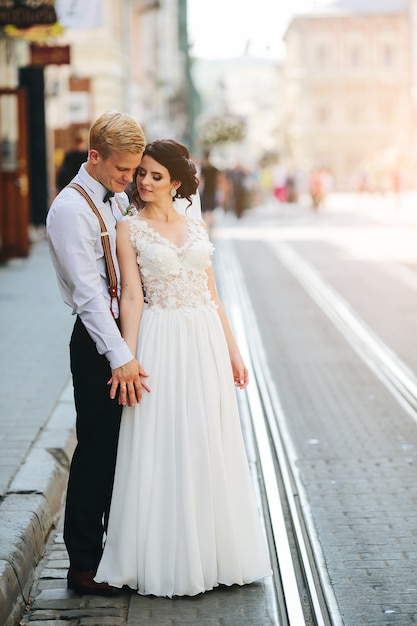 Couple with hands clasped