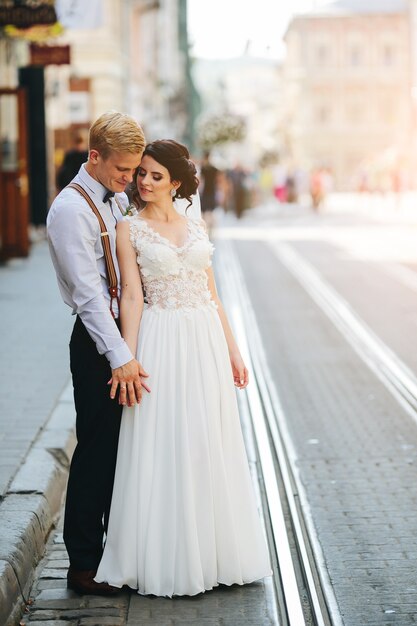 Couple with hands clasped