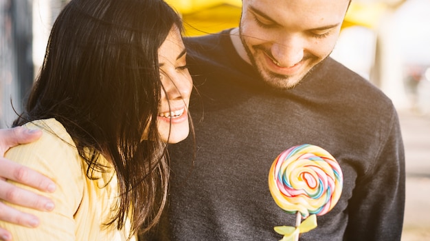 Free Photo couple with lollipop