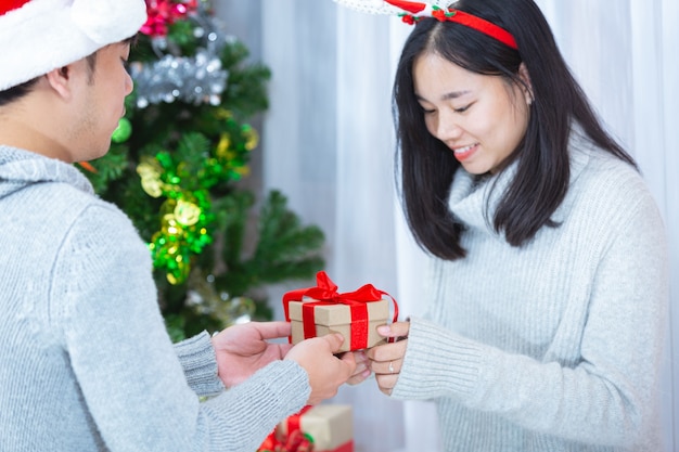 couples enjoying with christmas present