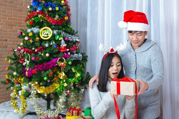 couples enjoying with christmas present