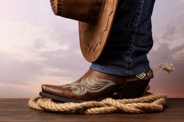 Cowboy background with boots