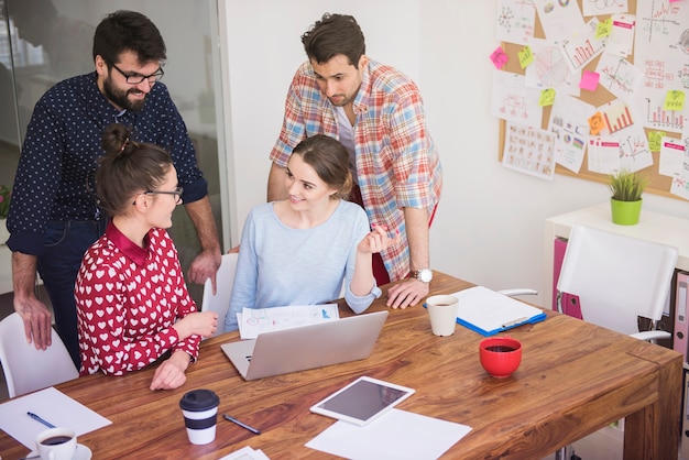 Coworkers working at office in a relaxed atmosphere