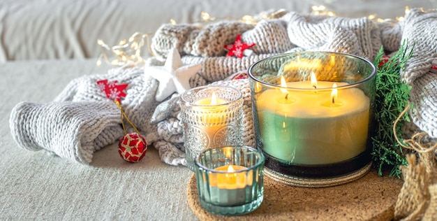 Free photo cozy christmas composition with candles christmas concept