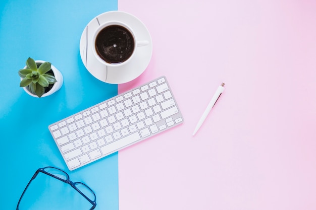 Cozy desktop with keypad and cup