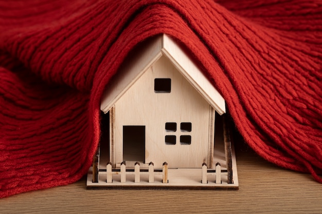 Free photo cozy house concept with wooden toy house