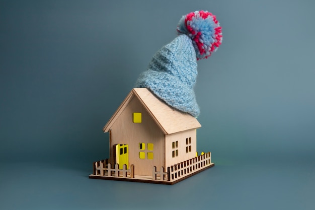 Free photo cozy house concept with wooden toy house