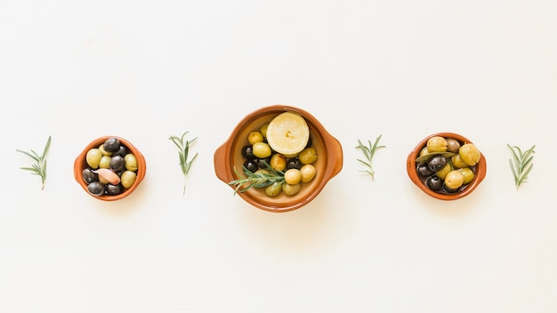 Free photo cozy layout of olive plates