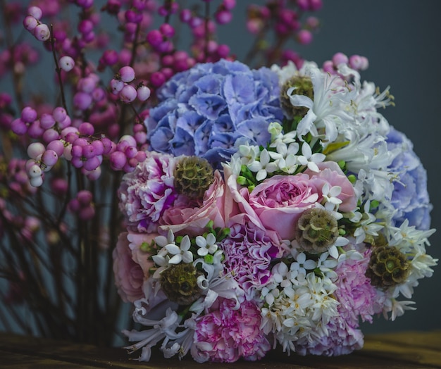 Free Photo a cozy, pretty bouquet of blue and purple combination of flowers.