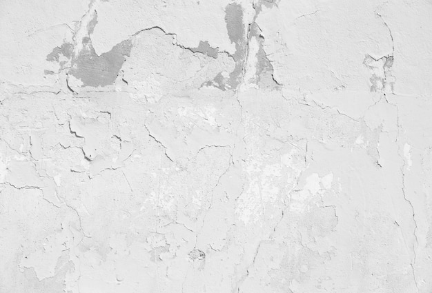 Cracked flaked pale wall