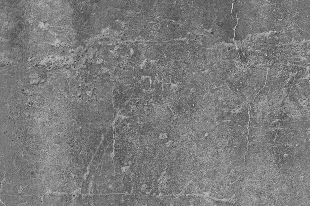 Cracked grey plaster surface