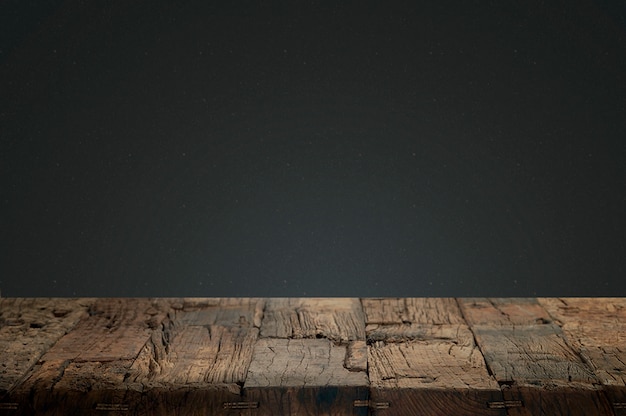 Cracked wood with a dark background