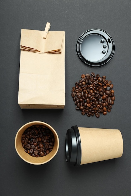 Free Photo craft cups for coffee with coffee beans on a black background