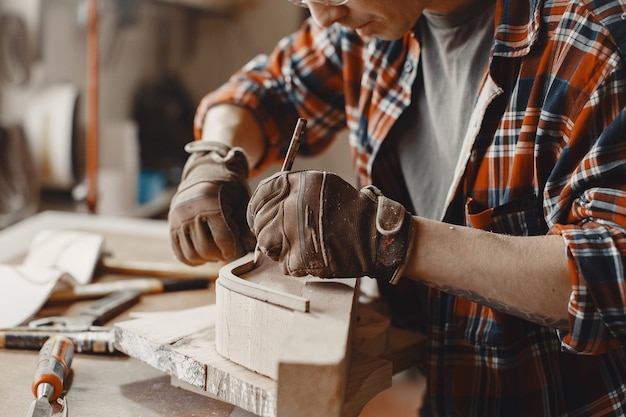 Craftsman creating wood piece