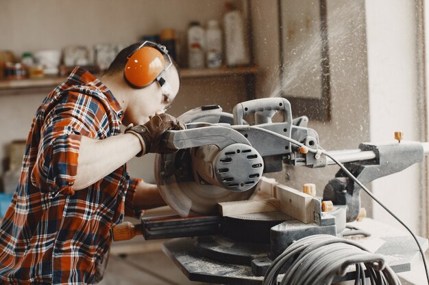 Craftsman using circular saw