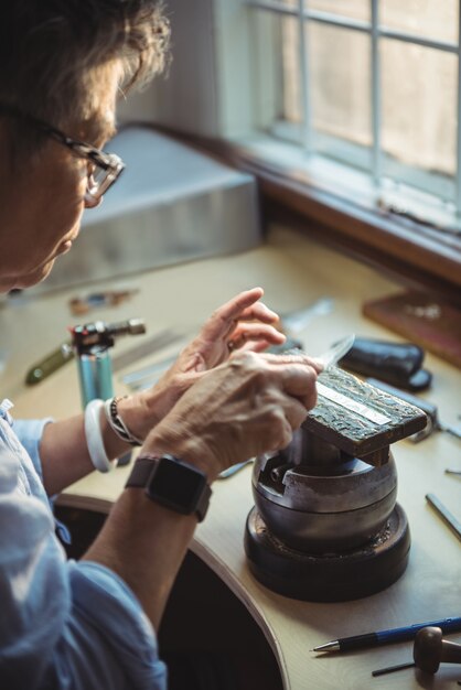 Craftswoman working in workshop