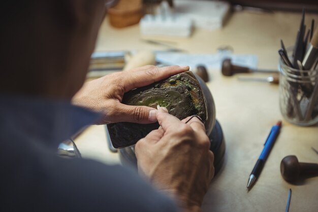 Craftswoman working in workshop