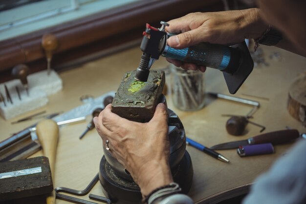 Craftswoman working in workshop