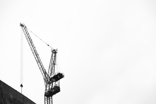 Free photo crane in the sky at a construction site