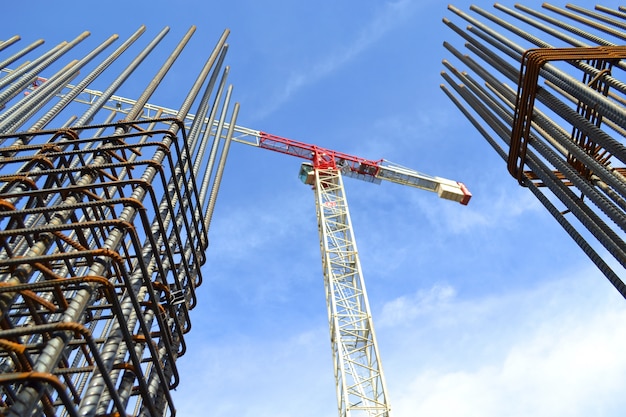 Crane between two buildings under construction