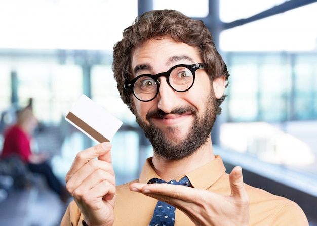 Free photo crazy man with credit card.funny expression