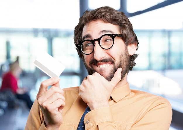 Free photo crazy man with credit card.funny expression