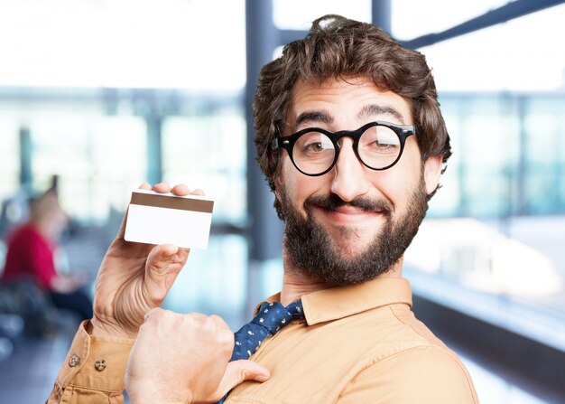 crazy man with credit card.funny expression