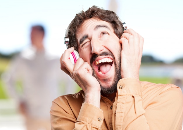 crazy man with headphones.funny expression