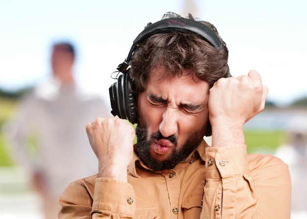 crazy man with headphones.funny expression