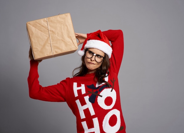 Free photo crazy woman with big christmas present