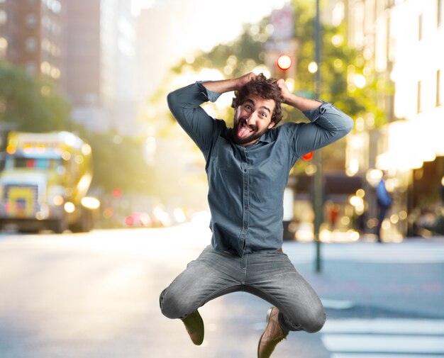 Free Photo crazy young man jumping. happy expression