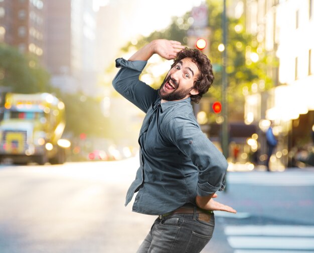 crazy young man jumping. happy expression