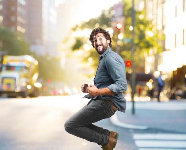 crazy young man jumping. happy expression