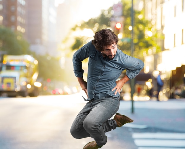 crazy young man jumping. happy expression