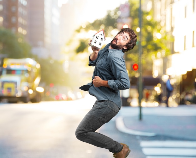 crazy young man jumping. happy expression