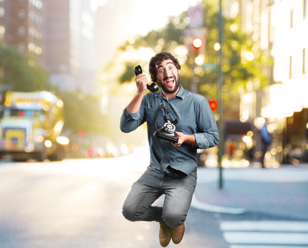 crazy young man jumping. happy expression