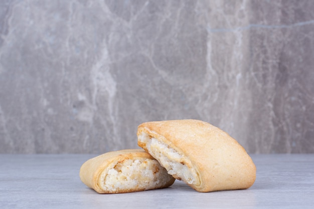 Cream filled biscuits on marble table
.